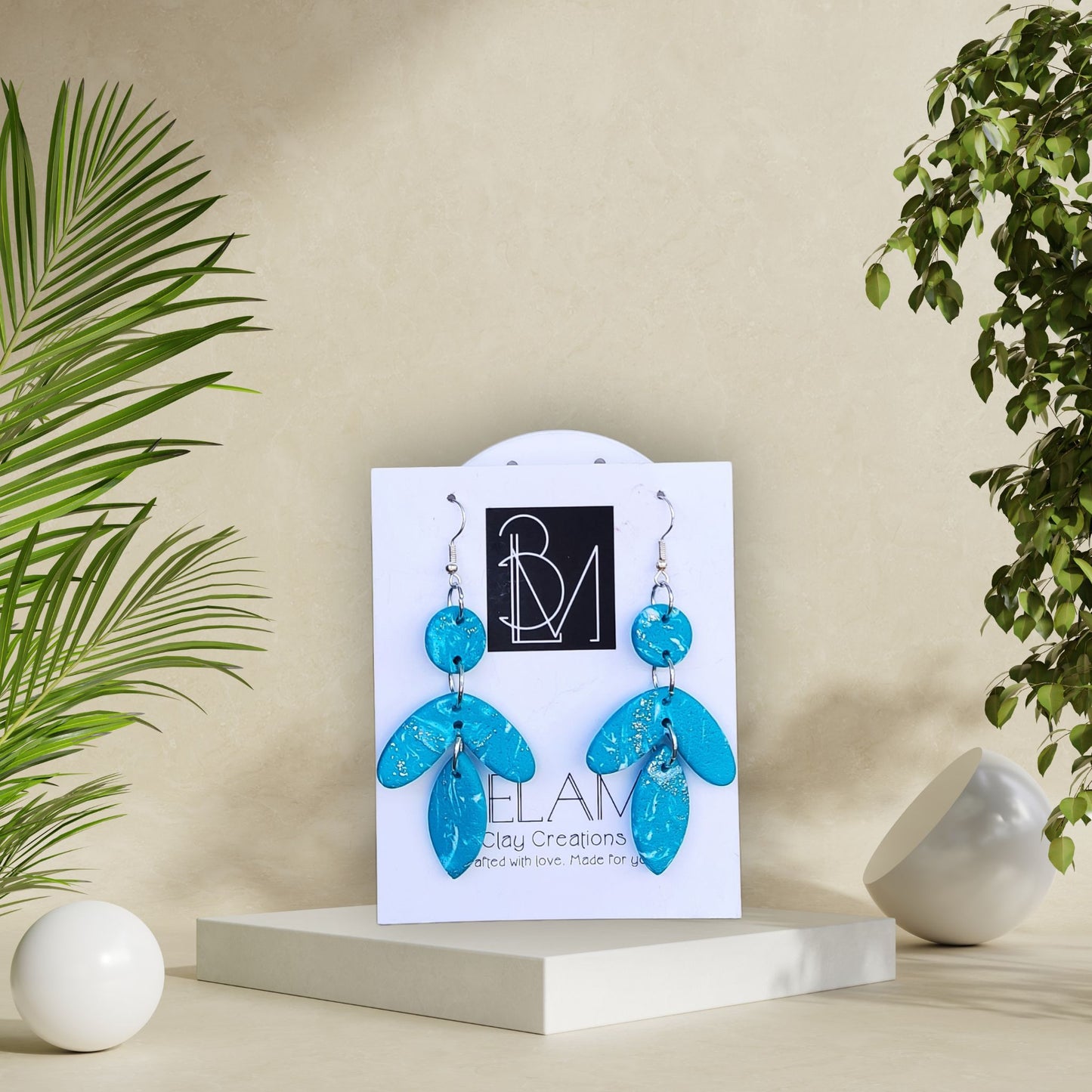 AQUA LEAF – Σκουλαρίκια σε τυρκουάζ με ασημί λεπτομέρειες